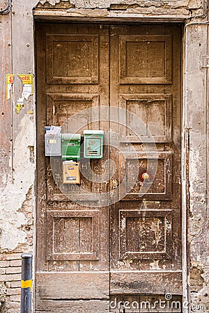 Door with multiple postboxes on in Furore Stock Photo