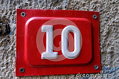 Door number 10 on concrete background Stock Photo