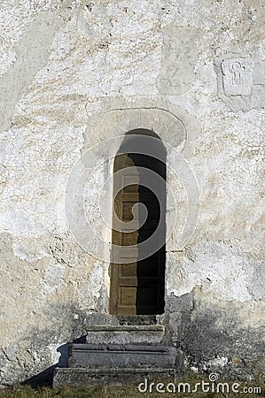 Door on stone wall Stock Photo