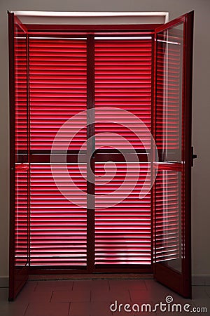 Door on verandah which is closed jalousies Stock Photo