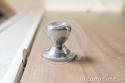 A door knob waits to be turned. Stock Photo