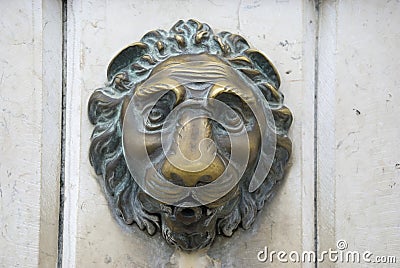 Doorknob - metallic lion of venice, italy Stock Photo