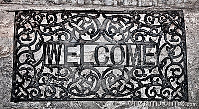 The Doormat curved steel of welcome text Stock Photo