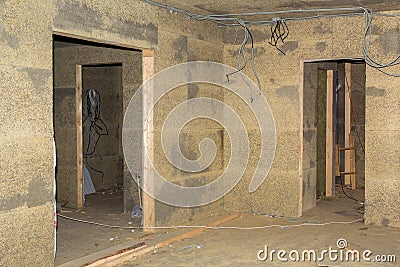 Doorways in walls of fibrolite plates Stock Photo
