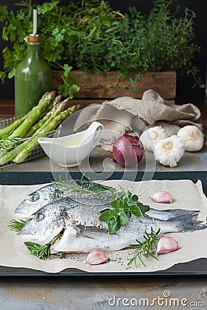 Dorade fish in cooking process Stock Photo