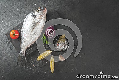 Dorado fish with ingredients for cooking Stock Photo