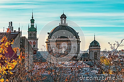 Dormition Church tower and Dominican Church dome in Lviv, Ukraine Stock Photo
