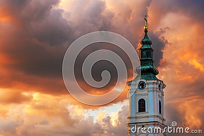 Dormition church tower in Novi Sad, Serbia. Beautiful orthodox religious building in summer sunset Stock Photo