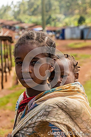 DORZE, ETHIOPIA - JANUARY 29, 2020: Girls of Dorze ethnicity, Ethiop Editorial Stock Photo