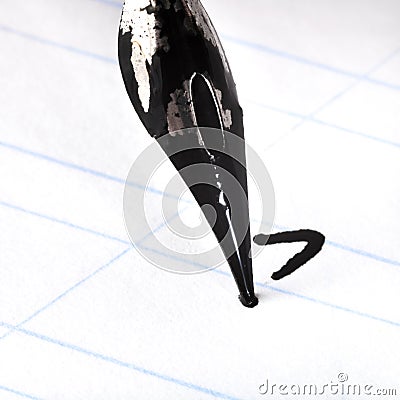 Dot the I by tip of nib of ink drawing pen Stock Photo