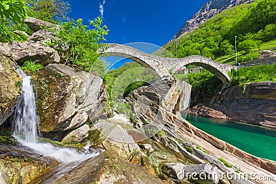 Double arch stone bridge at Ponte dei Salti with waterfall, Lavertezzo, Verzascatal, Ticino, Switzerland Stock Photo