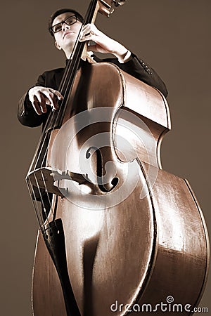 Double bass player with contrabass Stock Photo