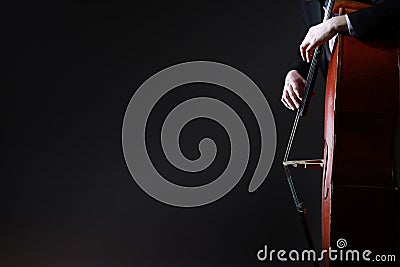 Double bass player playing contrabass Stock Photo