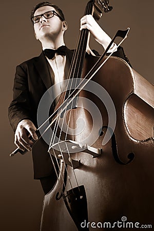 Double bass player with contrabass Stock Photo