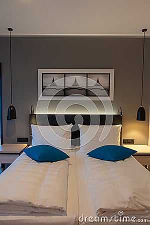 Double bed in a luxurious hotel room Stock Photo