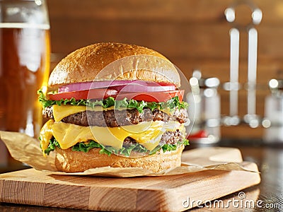 Double cheese burger with beer Stock Photo