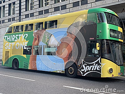 Double-decker buses in London usually have ads on them from famous brands Editorial Stock Photo