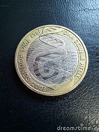 A 2003 double dna helix two pound coin, Audacious Antiques, Devon, UK Editorial Stock Photo