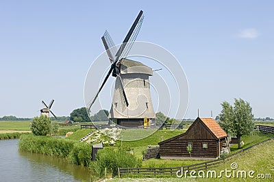 Double Dutch windmills Stock Photo