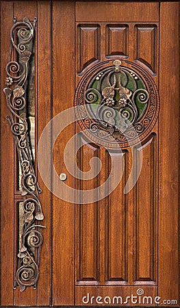 Double-edged exterior doors with forged lattices Stock Photo