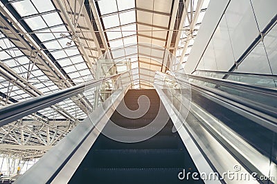 Double Escalator going up. Moving up staircase escalator. floor platform electric escalator Stock Photo