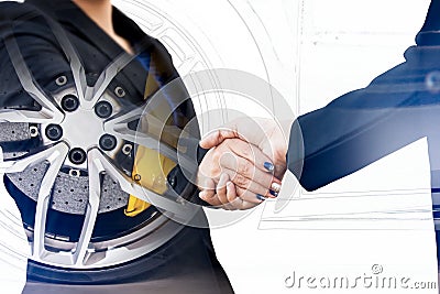 Double exposure of business handshake with wheel car Stock Photo