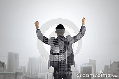 Double exposure of business man raise his hands Stock Photo