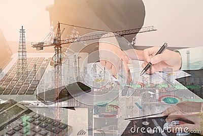 Double exposure business worker with graph finance and factory Stock Photo