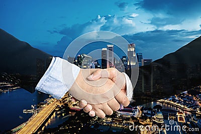 Double exposure, cooperation or partnership business shaking hand with partnership after making profitable agreement with Stock Photo