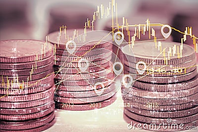 Double exposure gold coins money and graph economy Stock Photo