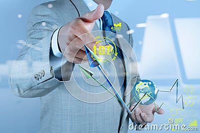 Double exposure of hand showing Internet of things (IoT) Stock Photo