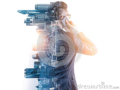 The double exposure image of the businessman using a smartphone during sunrise overlay with cityscape image. Stock Photo