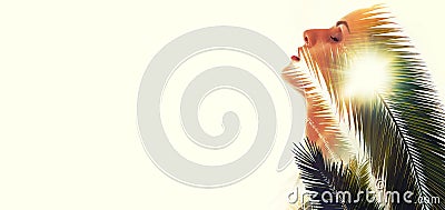 Double exposure woman and green palm tree leaves Stock Photo