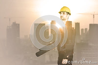 Double exposure of male civil carrying blueprints Stock Photo