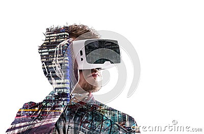 Double exposure. Man wearing virtual reality goggles. Night city Stock Photo