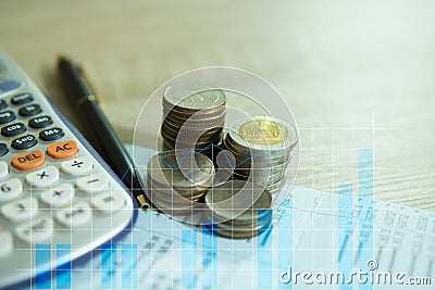 Double exposure of rows of coins on account book Stock Photo