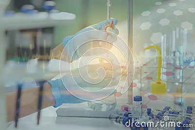 Double exposure of scientist is demonstrate the titration technique with graph Stock Photo