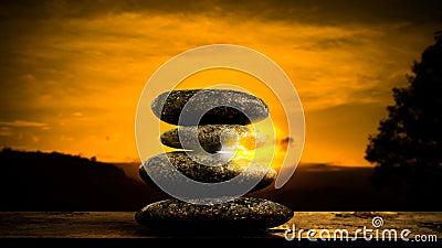 Double Exposure Stack Stone on Sunset Background Design Buddhism Nature Therapy Spa Massage,Concept for Aroma therapy Calm Stock Photo