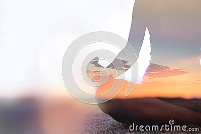 Double exposure of young woman practicing yoga in nature Stock Photo