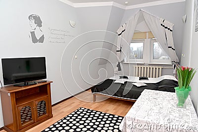 Double hotel room with a portrait of the Russian poetess Anna Ak Editorial Stock Photo