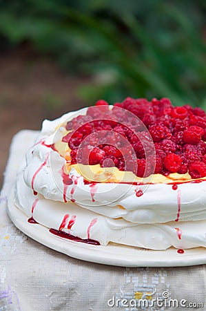 Double layered Pavlova on serving table Stock Photo