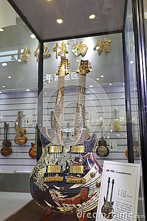 Double neck guitar showing Editorial Stock Photo