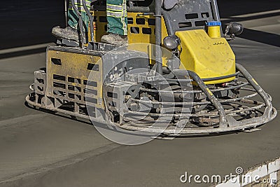 Double power trowel finishing concrete floor Stock Photo