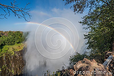 Double rainbow in spray at Victoria Falls Stock Photo