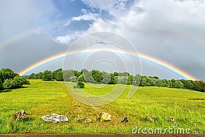 Double rainbow after a thunderstorm Stock Photo