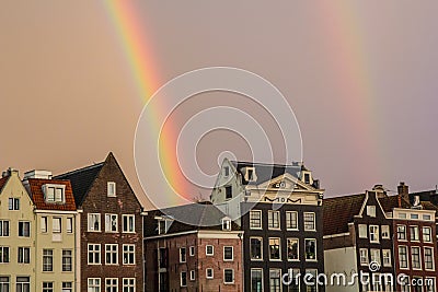 Double rainbow and traditional houses of Amsterdam Stock Photo