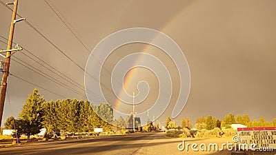 Double rainbow in the valley Stock Photo