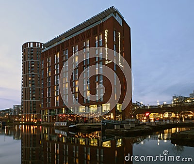 the doubletree hilton hotel in leeds next to the dock and canal developments illum Editorial Stock Photo