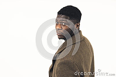doubtful black man raising his eyebrow white background - close-up shot Stock Photo