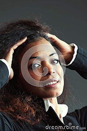 Doubtful Woman lifting hair, fake sensation Stock Photo